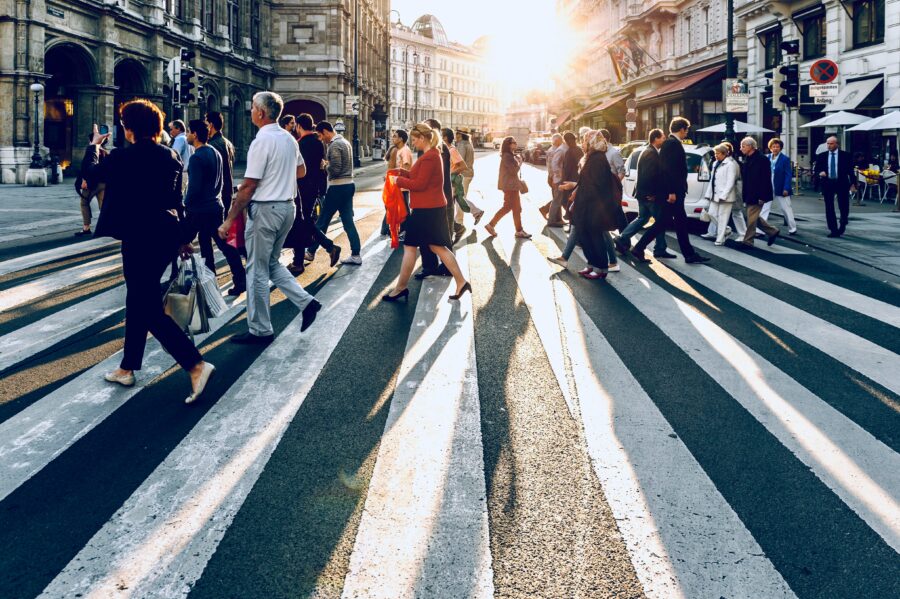 People crossing street in Vienna.