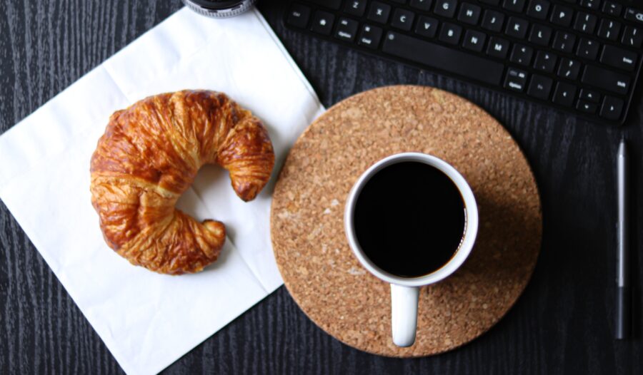 breakfast flatlay coffee croissant