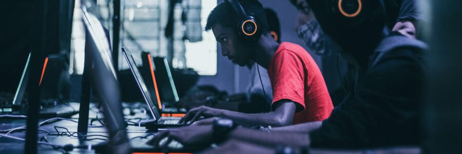Gamers playing on Laptops